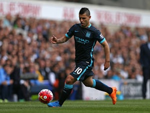 Manchester City's Argentinian striker Sergio Aguero runs with the ball during the English Premier League football match between Tottenham Hotspur and Manchester City at White Hart Lane in north London on September 26, 2015