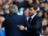Manuel Pellegrini (L), manager of Manchester City shows congratulates Mauricio Pochettino (R) Manager of Tottenham Hotspur after the Barclays Premier League match between Tottenham Hotspur and Manchester City at White Hart Lane on September 26, 2015