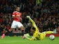 Anthony Martial of Manchester United scores his team's third goal past Bartosz Bialkowski of Ipswich Town during the Capital One Cup Third Round match between Manchester United and Ipswich Town at Old Trafford on September 23, 2015 