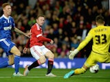 Wayne Rooney of Manchester United scores the opening goal past Bartosz Bialkowski of Ipswich Town during the Capital One Cup Third Round match between Manchester United and Ipswich Town at Old Trafford on September 23, 2015