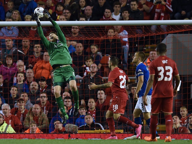 Carlisle United's English goalkeeper Mark Gillespie (L) claims the ball during the English League Cup third round football match between Liverpool and Carlisle United at Anfield in Liverpool, north west England on September 23, 2015