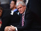 Mark Hughes manager of Stoke City looks on prior to the Barclays Premier League match between Stoke City and A.F.C. Bournemouth at Britannia Stadium on September 26, 2015