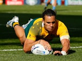 Matt Toomua of Australia dives over to score their tenth try during the 2015 Rugby World Cup Pool A match between Australia and Uruguay at Villa Park on September 27, 2015