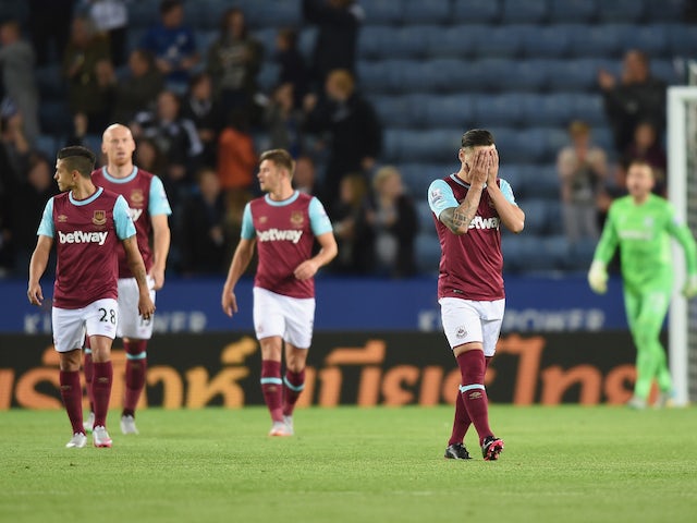Mauro Zarate of West Ham looks dejected after the first Leicester goal during the Capital One Cup Third Round match between Leicester City and West Ham United at The King Power Stadium on September 22, 2015 in Leicester, England.