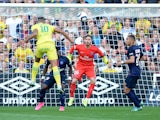 Nantes' French forward Yacine Bammou (L) scores a goal during the French L1 football match between Nantes (FCN) and Paris Saint-Germain (PSG) on September 26, 2015