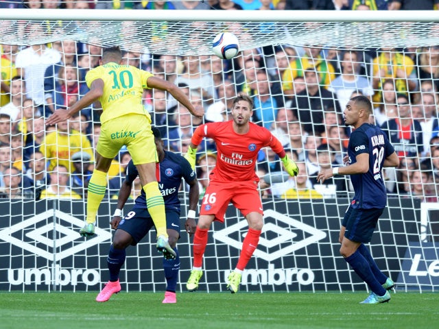Nantes' French forward Yacine Bammou (L) scores a goal during the French L1 football match between Nantes (FCN) and Paris Saint-Germain (PSG) on September 26, 2015