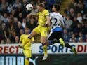 Tom Lees of Sheffield Wednesday vies with Daryl Janmaat of Newcastle United during the Capital One Cup Third Round match between Newcastle United and Sheffield Wednesday at St James Park on September 23, 2015