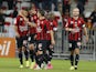 Nice's French forward Hatem Ben Arfa is congratulated by teammates after scoring a goal during the French L1 football match Nice (OGC Nice) vs Bordeaux (GB) on September 23, 2015 