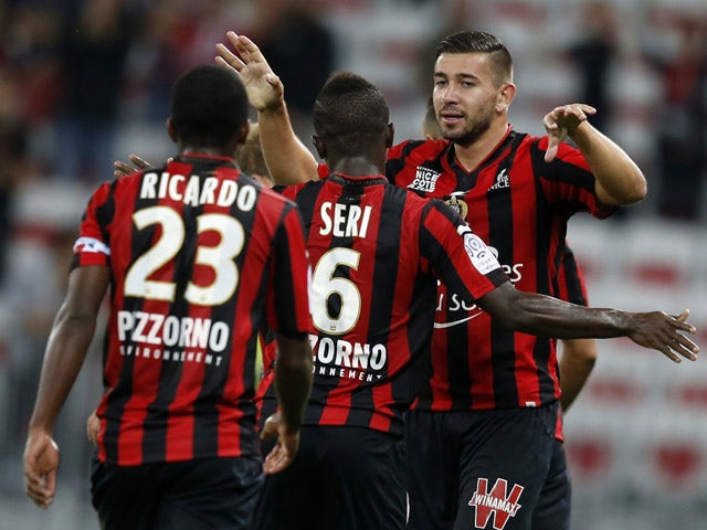 Nice's French forward Mickael Le Bihan (R) celebrates with teammates after scoring a goal during the French L1 football match Nice (OGC Nice) vs Bordeaux (GB) on September 23, 2015