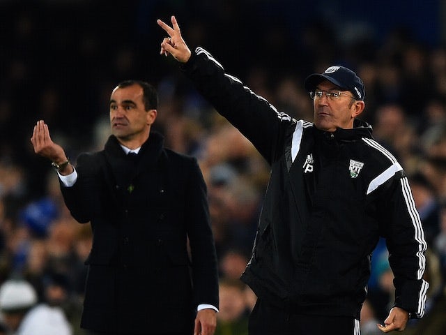 Everton manager Roberto Martinez and West Bromwich Albion boss Tony Pulis during a Premier League match on January 19, 2015