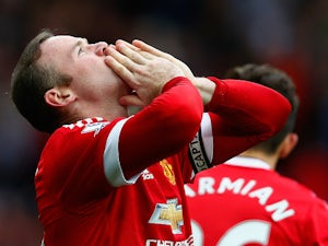 Rooney equals Denis Law's goals record