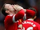 Rooney equals Denis Law's goals record