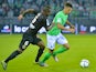 Nice's Ivorian midfielder Jean Michel Seri (L) vies with Saint-Etienne's French defender Kevin Malcuit during the French L1 football match between Saint-Etienne (ASSE) and Nice (OGCN) at Geoffroy Guichard Stadium in Saint-Etienne, central France, on Septe
