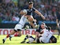 Sean Maitland of Scotland makes a break during the 2015 Rugby World Cup Pool B match between Scotland and USA at Elland Road on September 27, 2015