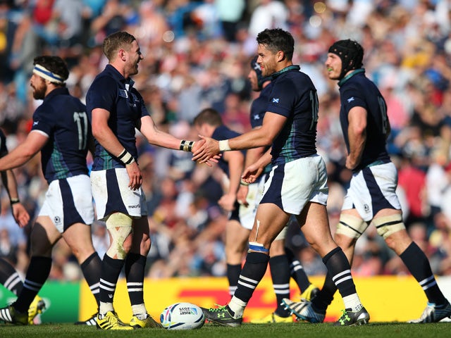 Sean Maitland (R) of Scotland celebrates scoring his teams second try during the 2015 Rugby World Cup Pool B match between Scotland and USA at Elland Road on September 27, 2015