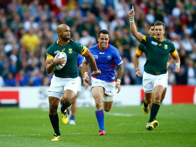 JP Pietersen of South Africa breaks clear to score the opening try during the 2015 Rugby World Cup Pool B match between South Africa and Samoa at Villa Park on September 26, 2015 in Birmingham, United Kingdom.