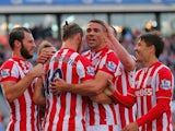 Jonathan Walters (2nd R) of Stoke City celebrates scoring his team's first goal with his team mates during the Barclays Premier League match between Stoke City and A.F.C. Bournemouth at Britannia Stadium on September 26, 2015