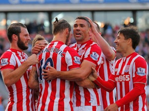 Jonathan Walters (2nd R) of Stoke City celebrates scoring his team's first goal with his team mates during the Barclays Premier League match between Stoke City and A.F.C. Bournemouth at Britannia Stadium on September 26, 2015