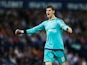 Thibaut Courtois of Chelsea celebrates the opening goal scored by Pedro of Chelsea during the Barclays Premier League match between West Bromwich Albion and Chelsea at The Hawthorns on August 23, 2015