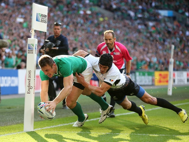 Tommy Bowe of Ireland scores his teams first try during the 2015 Rugby World Cup Pool D match between Ireland and Romania at Wembley Stadium on September 27, 2015