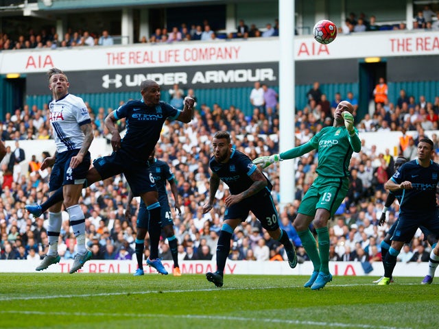 Toby Alderweireld (2nd L) of Tottenham Hotspur scores his team's second goal during the Barclays Premier League match between Tottenham Hotspur and Manchester City at White Hart Lane on September 26, 2015