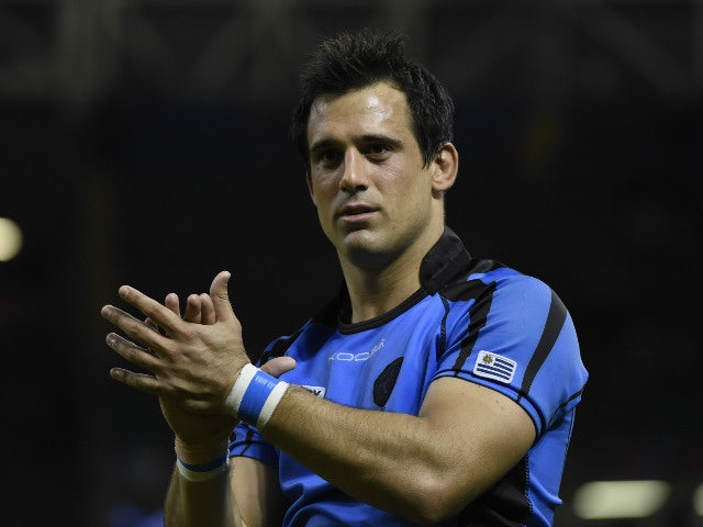 Uruguary's lock Santiago Vilaseca applauds the fans after losing a Pool A match of the 2015 Rugby World Cup between Wales and Uruguay at the Millennium stadium in Cardiff, south Wales on September 20, 2015.