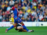Dwight Gayle of Crystal Palace hits the post with a shot as Craig Cathcart of Watford challenges during the Barclays Premier League match between Watford and Crystal Palace at Vicarage Road on September 27, 2015
