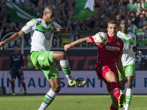 Bas Dost hands lead to Wolfsburg