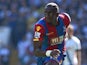 Crystal Palace's French-born Congolese midfielder Yannick Bolasie runs with the ball during the English Premier League football match between Tottenham Hotspur and Crystal Palace at White Hart Lane in north London on September 20, 2015