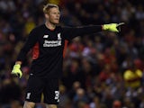 Liverpool's Hungarian goalkeeper Adam Bogdan gestures during the English League Cup football match between Liverpool and Carlisle United at Anfield in Liverpool, England on September 23, 2015.