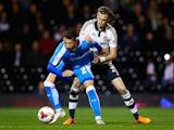 Adam Le Fondre of Wolves tackles with Richard Stearman of Fulham during the Sky Bet Football League Championship match between Fulham and Wolverhampton Wanderers at Craven Cottage on September 29, 2015 in London, England.