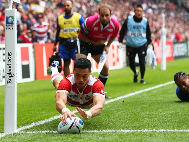 Akihito Yamada of Japan scores his teams second try during the 2015 Rugby World Cup Pool B match between Samoa and Japan at Stadium mk on October 3, 2015