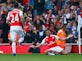 Half-Time Report: Three-goal Arsenal take Man United apart