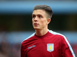 Jack Grealish of Aston Villa looks on during a warm- up prior to the Barclays Premier League match between Aston Villa and Stoke City at Villa Park on October 3, 2015