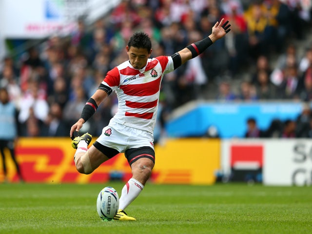 Ayumu Goromaru of Japan kicks at goal during the 2015 Rugby World Cup Pool B match between Samoa and Japan at Stadium mk on October 3, 2015