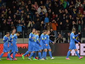 BATE's players celebrate a goal during the UEFA Champions League group E football match between FC BATE Borisov and AS Roma at the Borisov-Arena in Borisov outside Minsk on September 29, 2015.