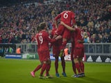 Bayern Munich's players celebrate after the fourth goal during the Group F, first-leg UEFA Champions League football match FC Bayern Munich vs GNK Dinamo Zagreb in Munich, on September 29, 2015. 