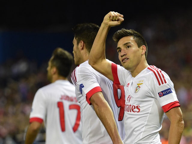 Benfica's Argentinian midfielder Nicolas Gaitan celebrates after scoring a goal during the UEFA Champions League football match Club Atletico de Madrid vs SL Benfica at the Vicente Calderon stadium in Madrid on September 30, 2015