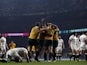 Australia's Bernard Foley celebrates scoring the first try during the Rugby World Cup game with England on October 3, 2015