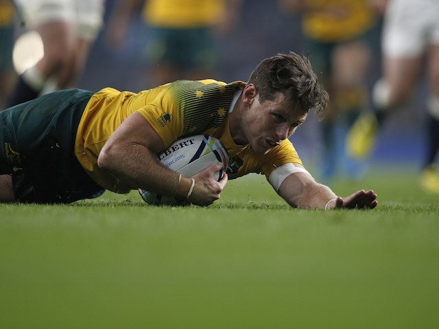 Bernard Foley scores the opening try for Australia during the Rugby World Cup game with England on October 3, 2015