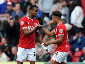Jonathan Kodjia of Bristol City celebrates his sides first goal with Bobby Reid of Bristol City during the Sky Bet Championship match between Bristol City and MK Dons at Ashton Gate on October 3, 2015