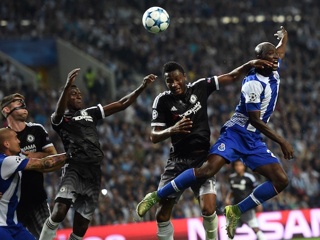 Chelsea's Nigerian midfielder John Obi Mikel (2nd R) vies with Porto's midfielder Danilo Pereira (R) during the UEFA Champions League Group G football match at the Dragao stadium in Porto on September 29, 2015. 