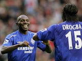 Geremi (L) of Chelsea is congratulated by Didier Drogba after scoring the fourth goal of the game during the Barclays Premiership match between Liverpool and Chelsea at Anfield on October 2, 2005
