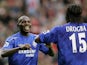 Geremi (L) of Chelsea is congratulated by Didier Drogba after scoring the fourth goal of the game during the Barclays Premiership match between Liverpool and Chelsea at Anfield on October 2, 2005