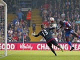 Crystal Palace's French-born Congolese midfielder Yannick Bolasie (2nd L) scores past West Bromwich Albion's US-born Welsh goalkeeper Boaz Myhill (L) for the opening goal of the English Premier League football match between Crystal Palace and West Bromwic