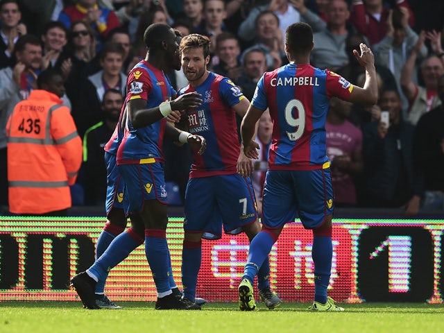 Yohan Cabaye (2nd R) of Crystal Palace celebrates scoring his team's second goal with his team mates during the Barclays Premier League match between Crystal Palace and West Bromwich Albion at Selhurst Park on October 3, 2015