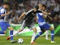 Chelsea's Brazilian-born Spanish striker Diego Costa (C) controls the ball next to Porto's midfielder Ruben Neves (L) and Brazilian defender Maicon during the UEFA Champions League Group G football match between FC Porto and Chelsea FC at the at the Draga