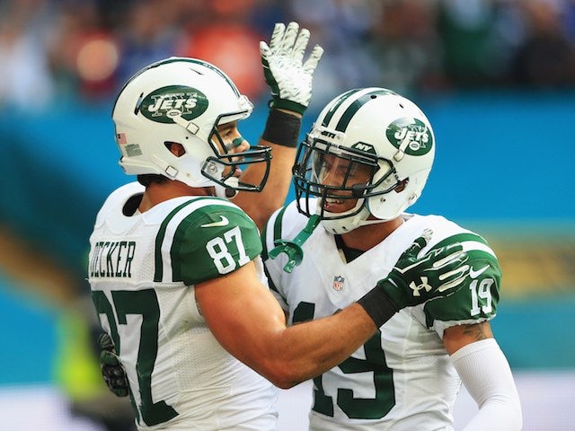 Eric Decker celebrates scoring his second touchdown for the New York Jets with Devin Smith in the game against the Miami Dolphins at Wembley on October 4, 2015