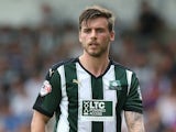 Graham Carey of Plymouth Argyle in action during the Sky Bet League Two match between Northampton Town and Plymouth Argyle at Sixfields Stadium on August 22, 2015 in Northampton, England.
