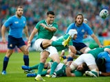Conor Murray of Ireland kicks the ball during the 2015 Rugby World Cup Pool D match between Ireland and Italy at the Olympic Stadium on October 4, 2015 in London, United Kingdom.